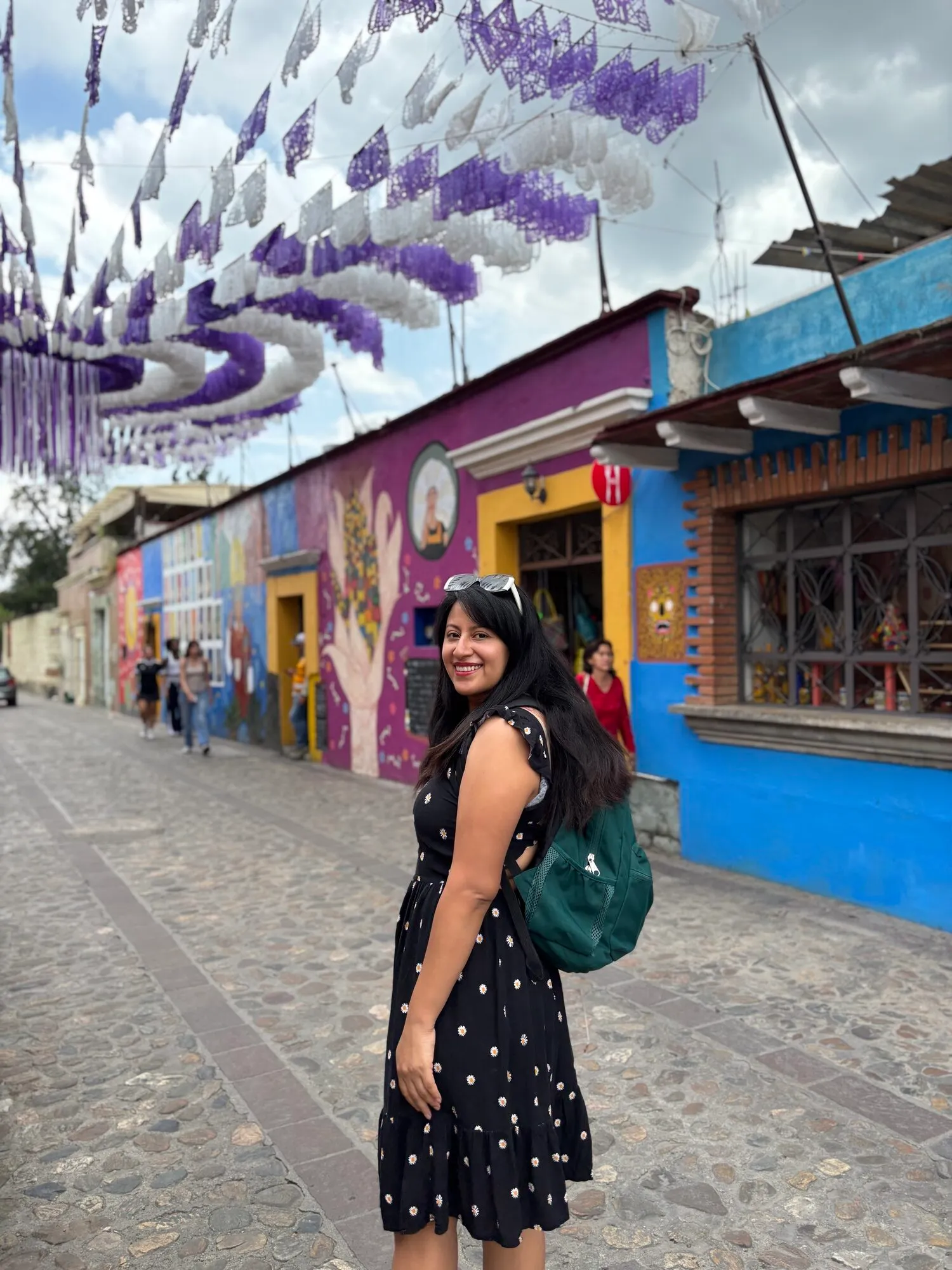 Dora on a colorful street in Jalatlaco