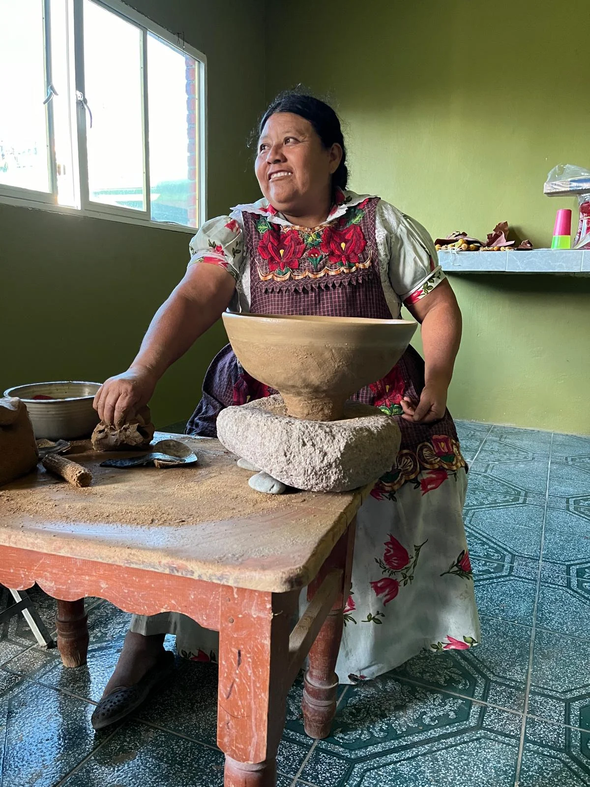 Woman making pottery